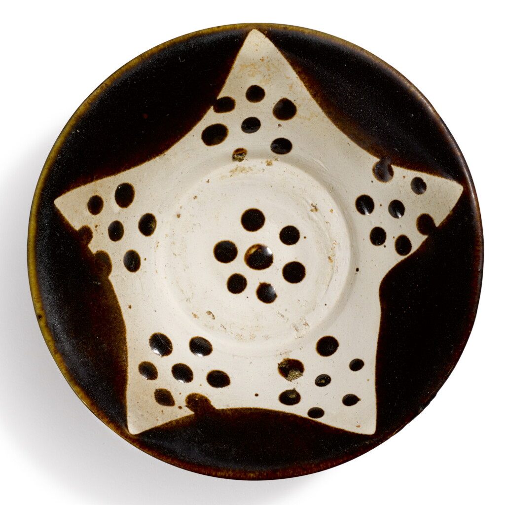 View full screen - View 1 of Lot 236. A 'Yaozhou' brown-glazed bowl, Tang dynasty | 唐 耀州窰黑釉點花紋盌.
