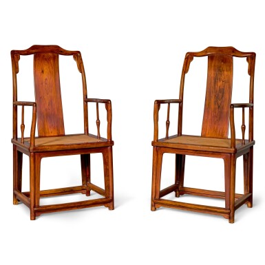 View full screen - View 1 of Lot 107. A MAGNIFICENT PAIR OF LARGE HUANGHUALI CONTINUOUS YOKEBACK ARMCHAIRS, NANGUANMAOYI, LATE MING DYNASTY | 晚明 黃花梨南官帽椅成對.