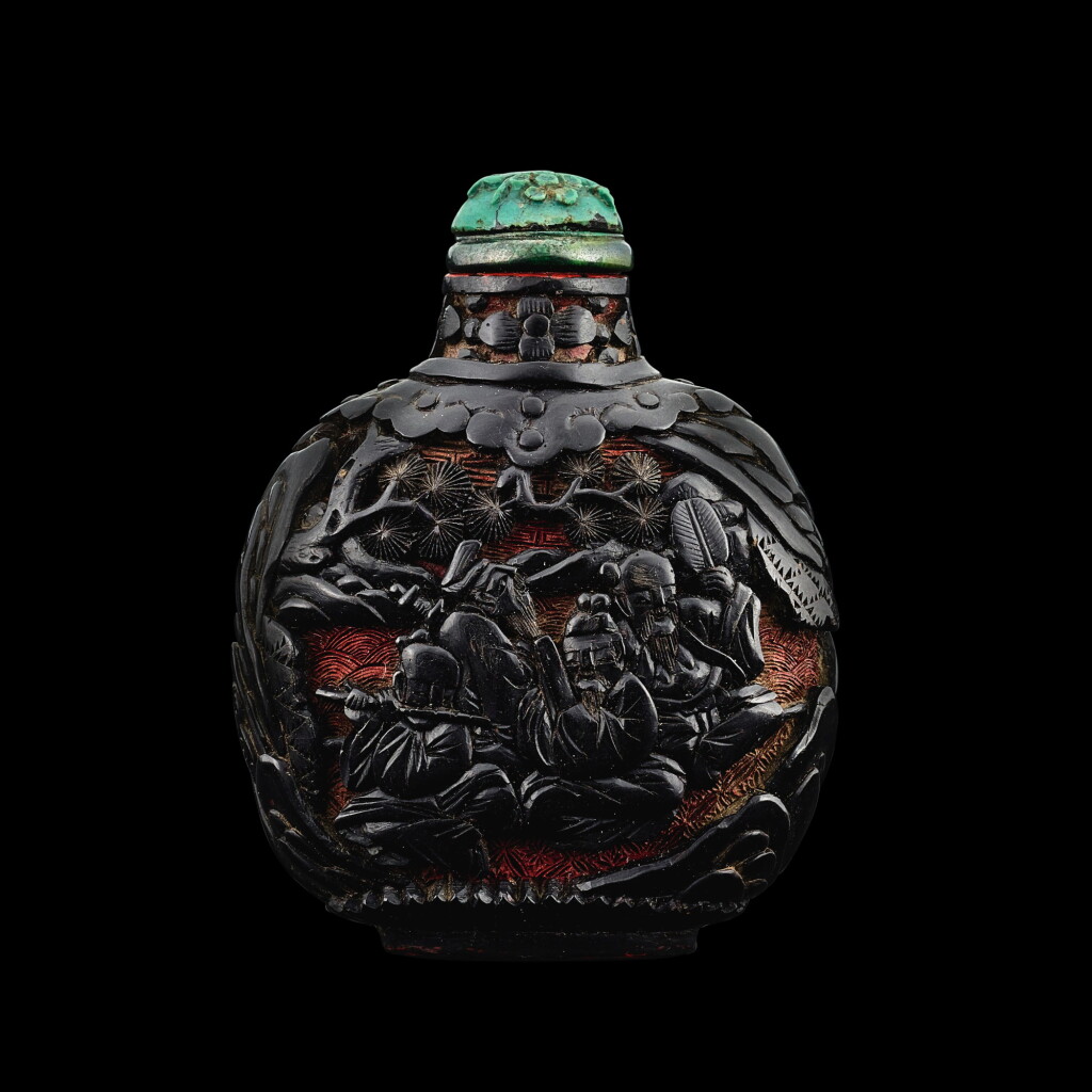 View full screen - View 1 of Lot 1074. A carved cinnabar and black lacquer 'eight immortals' snuff bottle, Qing dynasty, 18th - 19th century | 清十八至十九世紀 朱地剔黑八仙圖鼻煙壺.