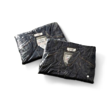 View full screen - View 1 of Lot 148. Two Levi Strauss jean jackets forming a cover for two magazines.