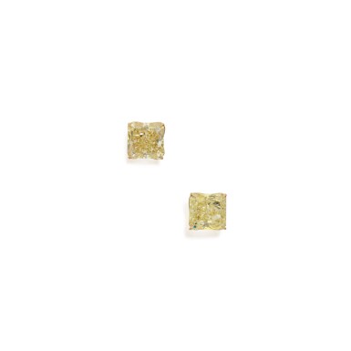 View full screen - View 1 of Lot 299. PAIR OF FANCY LIGHT YELLOW DIAMOND STUDS.