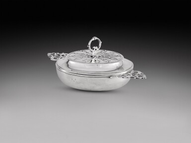 View full screen - View 1 of Lot 113. A French Provincial silver ecuelle and cover, maker's mark IG, also with crowned W mark and incuse X, possibly Wassy, Jurisdiction de Troyes, circa 1720.