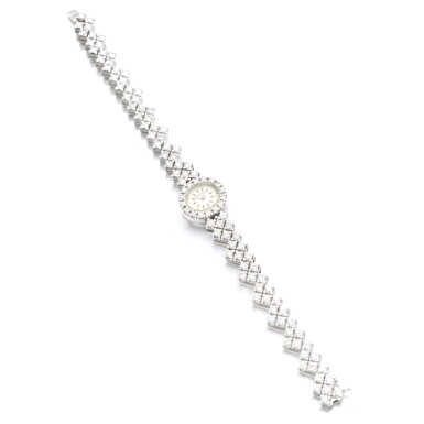 View full screen - View 1 of Lot 582. VACHERON CONSTANTIN | LADY’S DIAMOND WRISTWATCH .