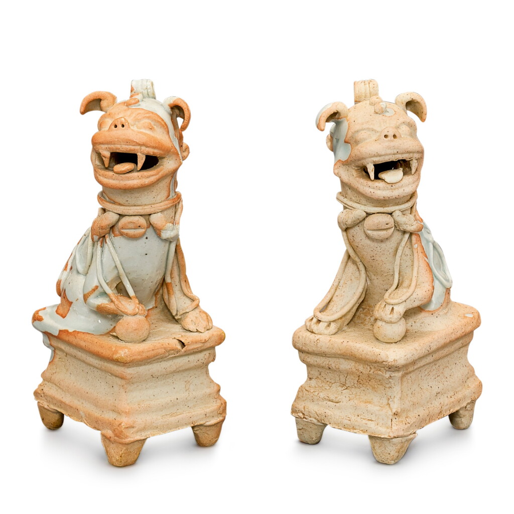 View full screen - View 1 of Lot 319. A PAIR OF QINGBAI FIGURES OF BUDDHIST LIONS YUAN DYNASTY | 元 青白釉坐獅一對.