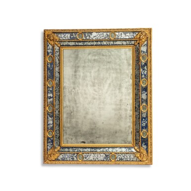 View full screen - View 1 of Lot 61. A Venitian verre églomisé, lava stone and giltwood mirror, late 17th-early 18th century.