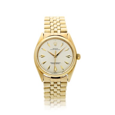 View full screen - View 1 of Lot 84. ROLEX | REFERENCE 1002 OYSTER PERPETUAL A YELLOW GOLD AUTOMATIC WRISTWATCH WITH BRACELET, CIRCA 1961.