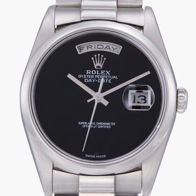 View full screen - View 1 of Lot 62. Day-Date, Reference 18206 | A platinum automatic wristwatch with bracelet and onyx dial | Circa 1991.