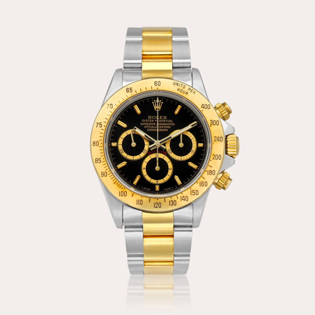 View full screen - View 1 of Lot 2110. Cosmograph Daytona "Inverted 6", Reference 16523 | A yellow gold and stainless steel chronograph wristwatch with bracelet, Circa 1993.