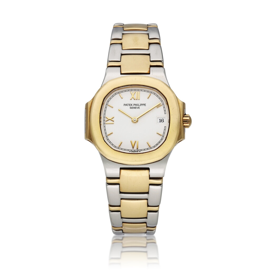 View full screen - View 1 of Lot 59. Reference 4700/5 Nautilus | A yellow gold and stainless steel wristwatch with date and bracelet, Circa 1985.