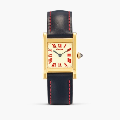 View full screen - View 1 of Lot 2385. Tank Normale | A yellow gold rectangular wristwatch with red numerals, Circa 1967-68 .