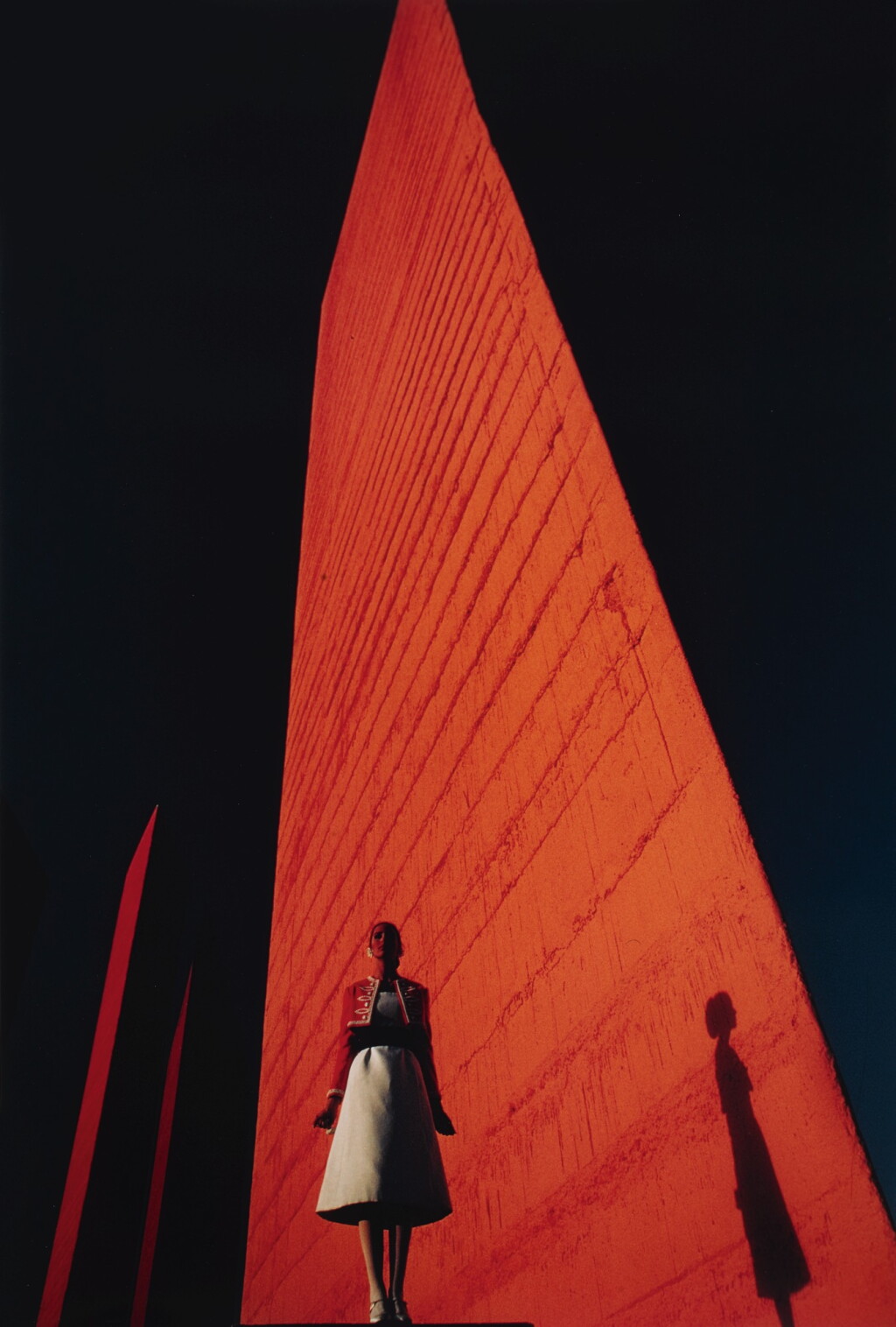 View full screen - View 1 of Lot 66. Cynthia Korman in front of a Luis Barragán Building .