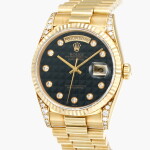 Day-Date, Reference 18338 | A yellow gold wristwatch with onyx hardstone pyramid dial, day, date and bracelet | Circa 1993