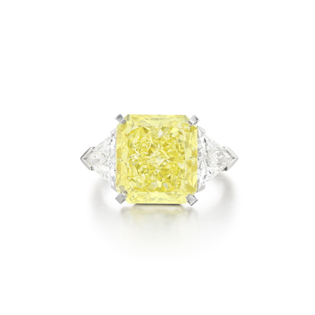 View full screen - View 1 of Lot 252. Fancy Intense Yellow diamond and diamond ring.