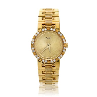 View full screen - View 1 of Lot 67. Reference 80564 K 81 Dancer A yellow gold and diamond-set bracelet watch, Circa 1990.