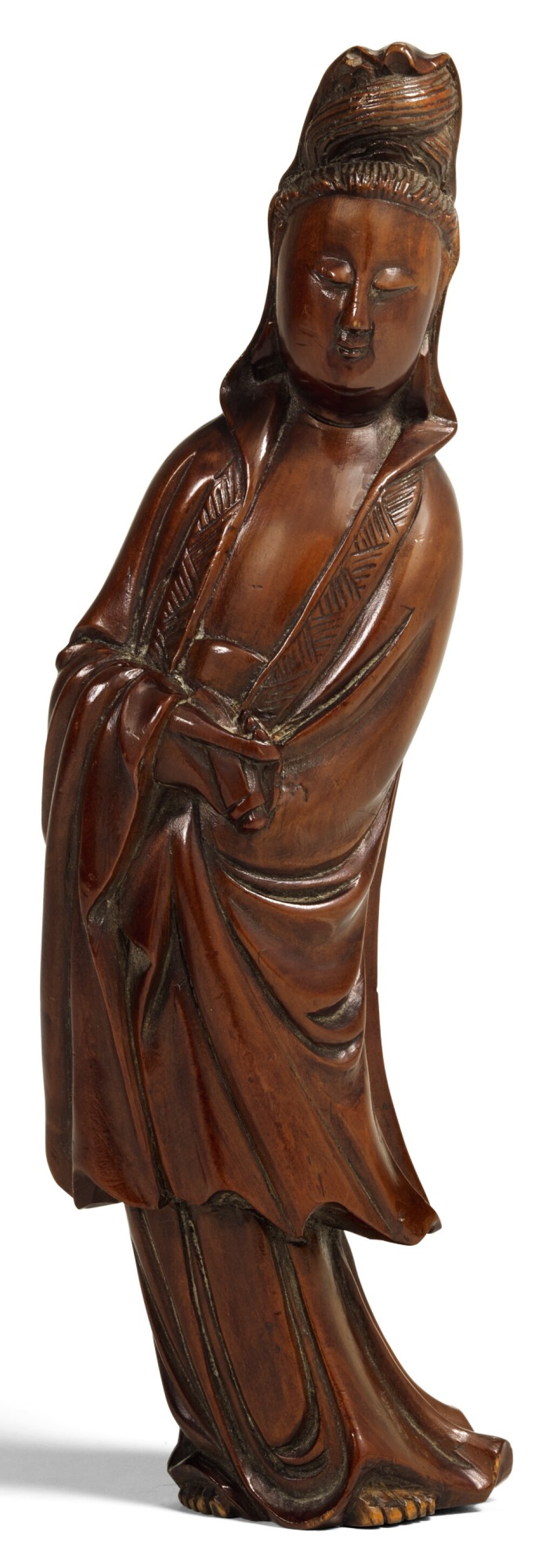 View full screen - View 1 of Lot 286. A BOXWOOD FIGURE OF GUANYIN QING DYNASTY, 18TH/19TH CENTURY | 清十八/十九世紀 黃楊木觀音立像.