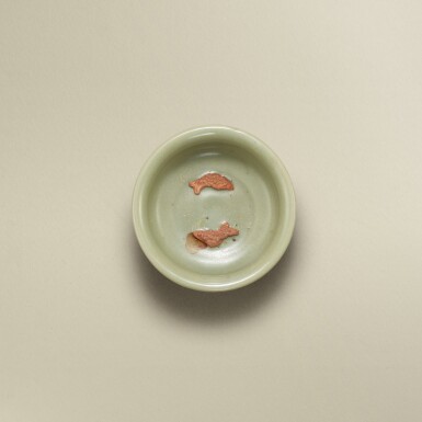View full screen - View 1 of Lot 5761. A small Longquan celadon-glazed 'double fish' bowl, Yuan dynasty | 元 龍泉青釉雙魚小盌.