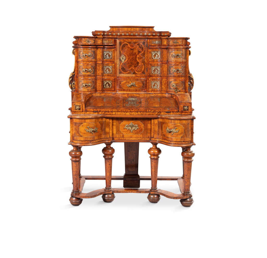View full screen - View 1 of Lot 29. A burr walnut and fruitwood desk, with pewter inlays and gilt bronze mounts, German, circa 1700 | Bureau à gradin en placage de noyer, loupe de noyer et bois fruitier, incrustations d'étain et monture bronze doré , Allemagne, vers 1700.