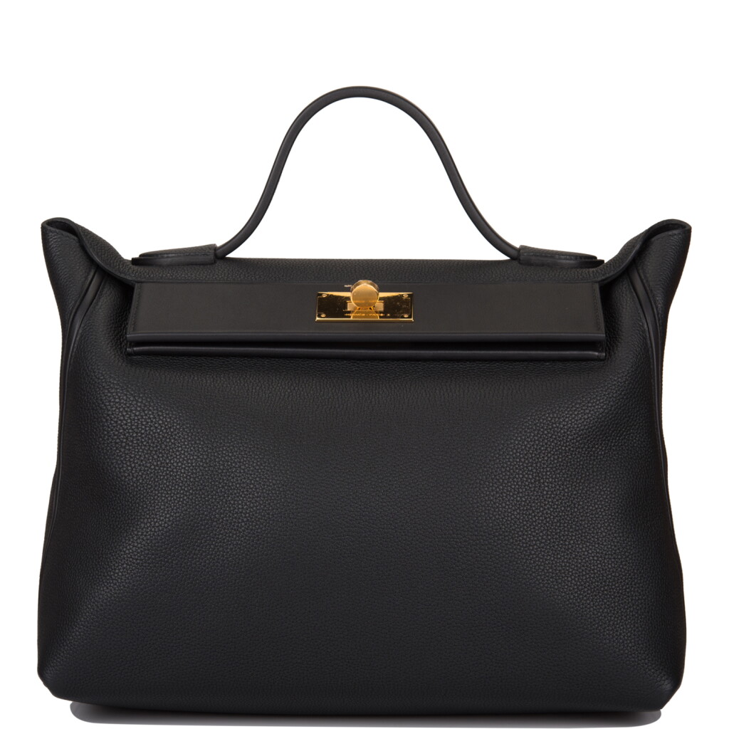 View full screen - View 1 of Lot 45. HERMÈS | BLACK 24/24 BAG 35CM OF MAURICE LEATHER WITH GOLD HARDWARE.