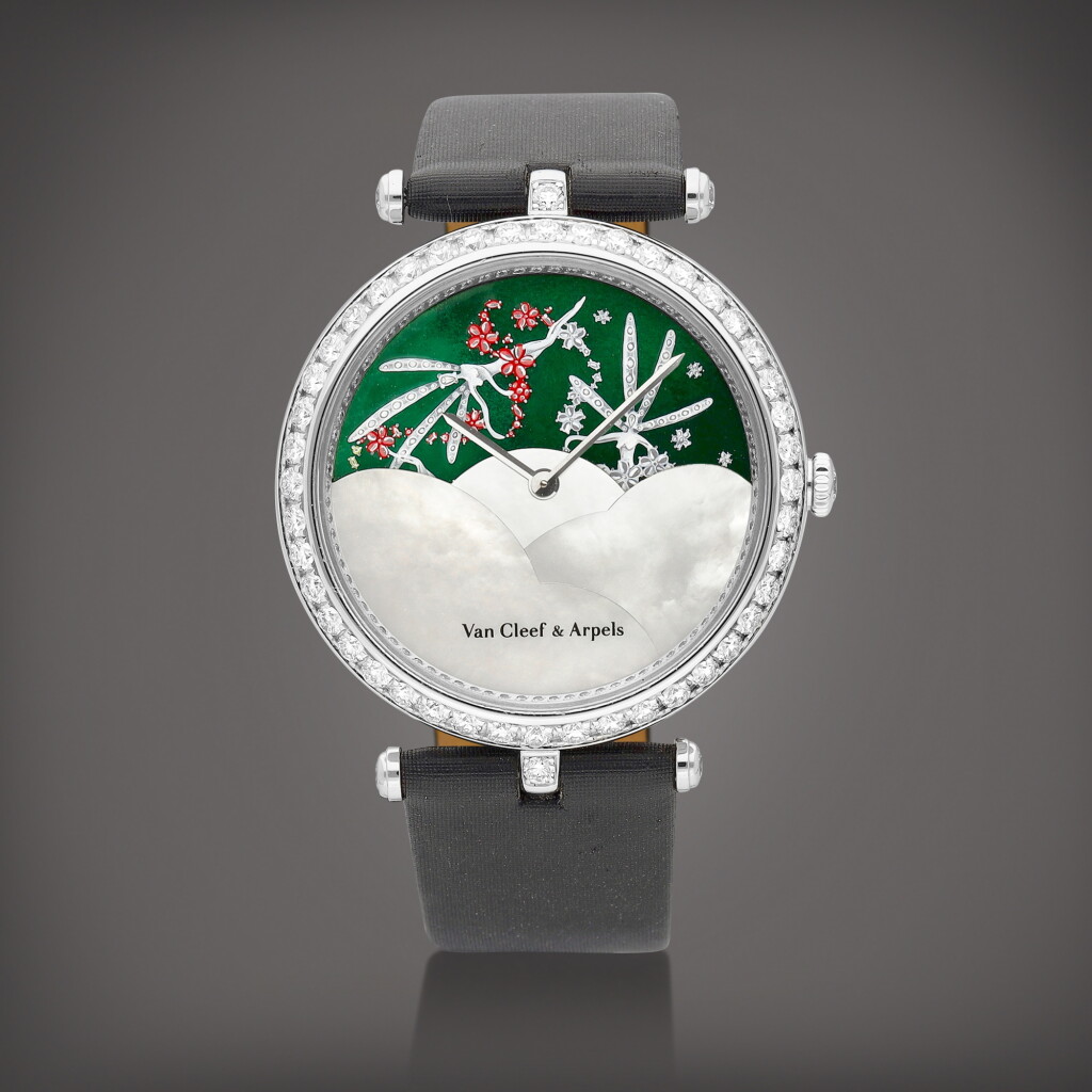 View full screen - View 1 of Lot 8940. Poetic Complications | A white gold and diamond-set wristwatch with date, month, enamel and mother-of-pearl dial, Circa 2010 | 梵克雅寶 | Poetic Complications | 白金鑲鑽石腕錶,備日期、月份顯示、琺瑯及珠母貝錶盤,約2010年製.