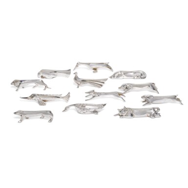 View full screen - View 1 of Lot 85. A good set of 12 French Gallia metal art Deco knife rests, Christofle. Designed by Edouard Marcel Sandoz, 20th century.
