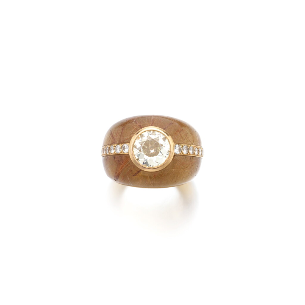 View full screen - View 1 of Lot 1002. Diamond and rutilated quartz ring.