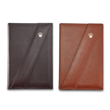 View full screen - View 1 of Lot 8083. A set of two leather notepads, Circa 1985 | 勞力士 | 一套兩件皮製筆記本,約1985年製.