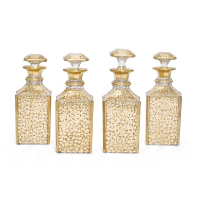 View full screen - View 1 of Lot 55. A set of four Victorian gilt-decorated glass decanter bottles, 19th century.