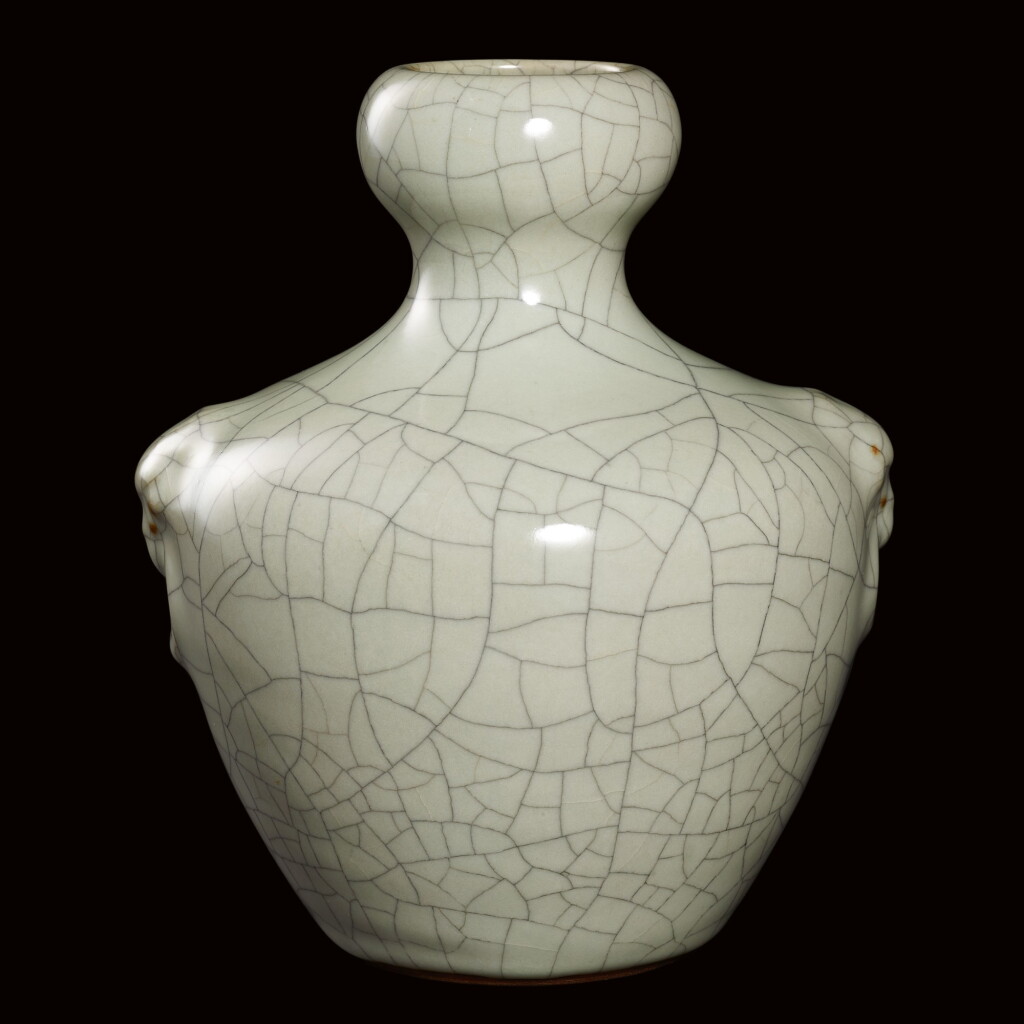 View full screen - View 1 of Lot 34. A RARE GUAN-TYPE VASE SEAL MARK AND PERIOD OF YONGZHENG | 清雍正 仿官釉鋪首蒜頭瓶 《大清雍正年製》款.