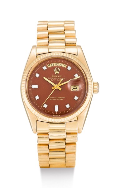 View full screen - View 1 of Lot 18. ROLEX | DAY-DATE, REFERENCE 1803, A PINK GOLD AND DIAMOND-SET WRISTWATCH WITH DAY, DATE, BROWN TOBACCO LACQUERED STELLA DIAL AND BRACELET, CIRCA 1974.