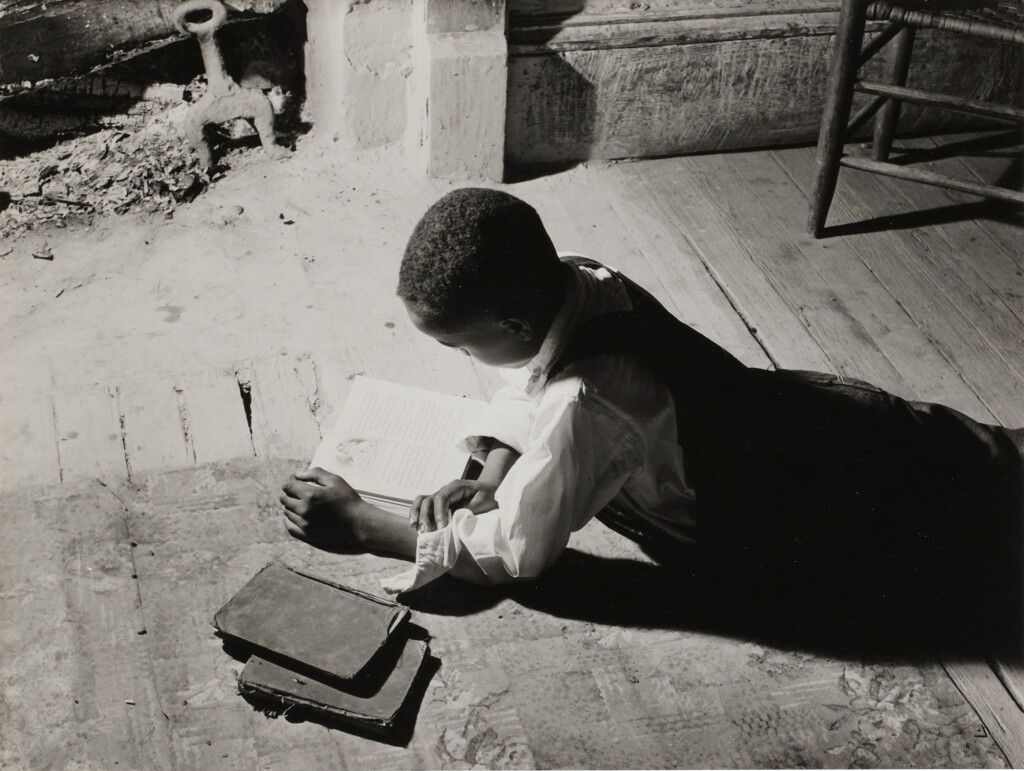 View full screen - View 1 of Lot 915. Boyd Jones doing his homework, Green County, Georgia.
