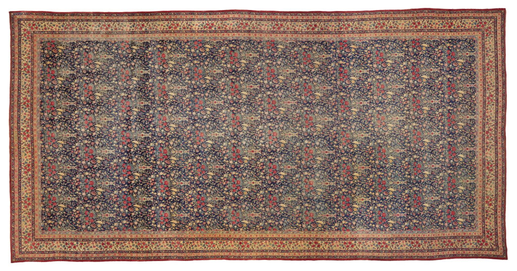 View full screen - View 1 of Lot 24. A Kirman Laver Carpet, South Central Persia.