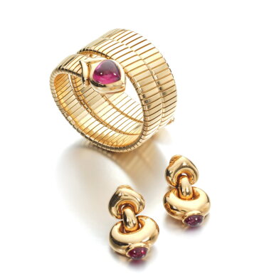 View full screen - View 1 of Lot 702. Tourmaline and gold bangle, 'Serpenti' and a pendent ear clips.