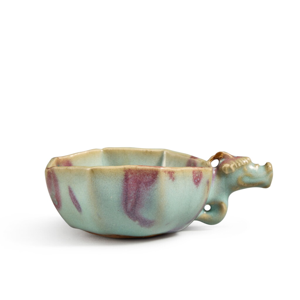 View full screen - View 1 of Lot 133. A rare ‘Jun' purple-splashed octagonal dragon-handled cup, Northern Song / Jin dynasty .