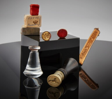 View full screen - View 1 of Lot 107. A group of four seals for the Egyptian Royal Family including two copper plates with the Egyptian Royal Crown and sealing wax .