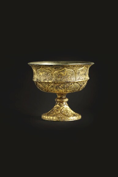 View full screen - View 1 of Lot 65. A magnificent and rare gilt-bronze silver-lined stem cup, Tang dynasty.
