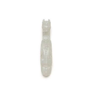 View full screen - View 1 of Lot 219. A PALE CELADON JADE 'DRAGON' BELT HOOK, QING DYNASTY, 18TH/19TH CENTURY | 清十八/十九世紀 青白玉雕螭龍紋帶鉤.