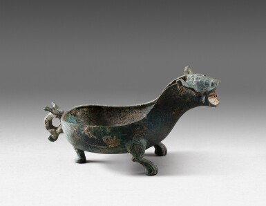 View full screen - View 1 of Lot 32. An archaic bronze pouring vessel, Yi Warring state period - Han dynasty | 戰國時期至漢 青銅獸形匜.