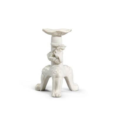 View full screen - View 1 of Lot 330. A Dehua tripod candlestick, Qing dynasty, Kangxi period.
