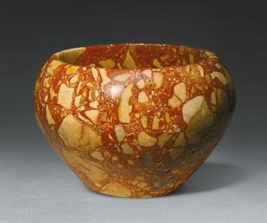 View full screen - View 1 of Lot 53. A LARGE EGYPTIAN BRECCIA BOWL, 1ST/2ND DYNASTY, 2965-2750 B.C..