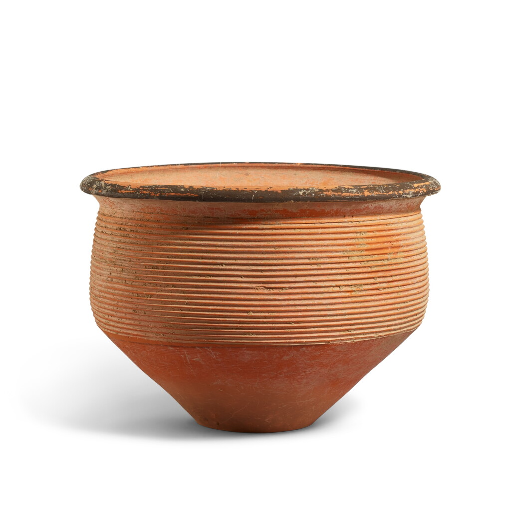 View full screen - View 1 of Lot 822. A large deep pottery bowl with horizontal grooves, Dawenkou to Longshan culture, 3rd millennium B.C. 大汶口至龍山文化 弦紋陶盌.