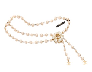 View full screen - View 1 of Lot 15. Faux pearl and camellia belt.