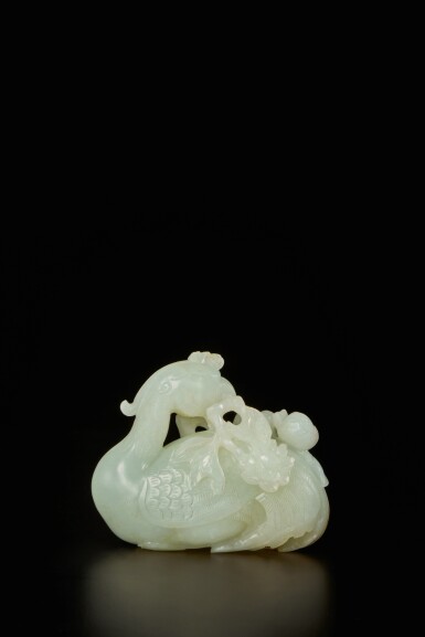 View full screen - View 1 of Lot 183. A pale celadon and russet jade 'phoenix and peony' group, Qing dynasty, Qianlong period.