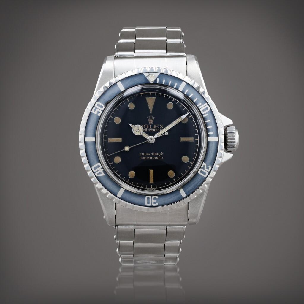 View full screen - View 1 of Lot 371. Submariner 'Gilt PCG', reference 5512 Montre bracelet en acier | Stainless steel wristwatch with bracelet Vers 1962 | Circa 1962.