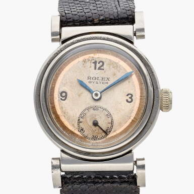 View full screen - View 1 of Lot 507. Oyster with articulated lugs | A stainless steel wristwatch with articulating lugs and two-tone dial, Circa 1934.