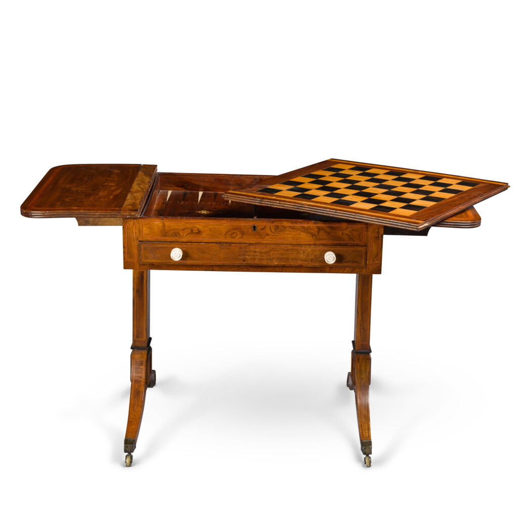 View full screen - View 1 of Lot 135. A Chinese Export padouk, ebony and satinwood crossbanded combined sofa and games table with ivory inlay and handles, circa 1820.