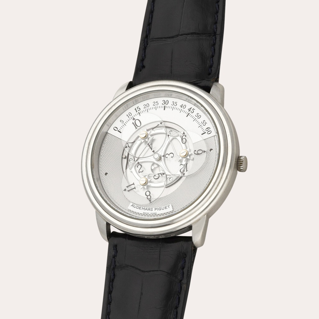 View full screen - View 1 of Lot 97. Star Wheel Automatic, Reference 25720 | A platinum semi-skeletonised wristwatch with satellite hour display | Circa 1997.