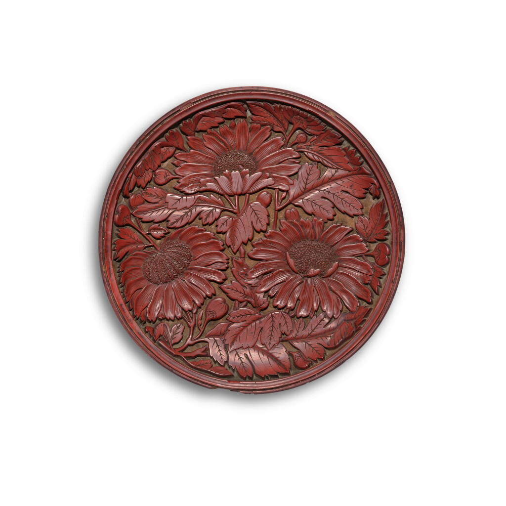 View full screen - View 1 of Lot 200. A finely carved cinnabar lacquer 'chrysanthemum' dish, Yuan dynasty | 元 剔紅雙菊紋盤.
