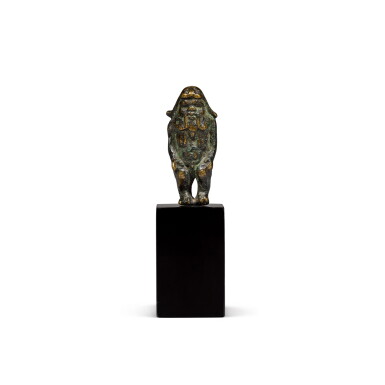 View full screen - View 1 of Lot 72. A small bronze figure, probably Egyptian 20th century | 或埃及 二十世紀 銅人物小立像.