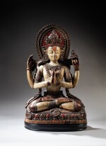 A polychrome wood figure of Avalokiteshvara Sadaksari, Nepal, 15th / 16th century | 尼泊爾 十五 / 十六世紀 四臂觀世音菩薩坐像