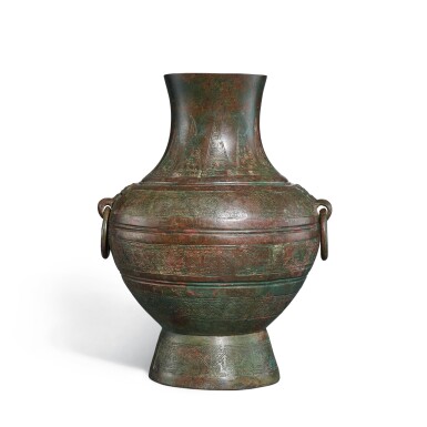 View full screen - View 1 of Lot 727. A bronze ritual wine vessel, hu, Eastern Zhou dynasty, Warring States period | 東周戰國 青銅幾何紋鋪首壺.